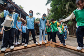 Prefects engage in a team-building game.